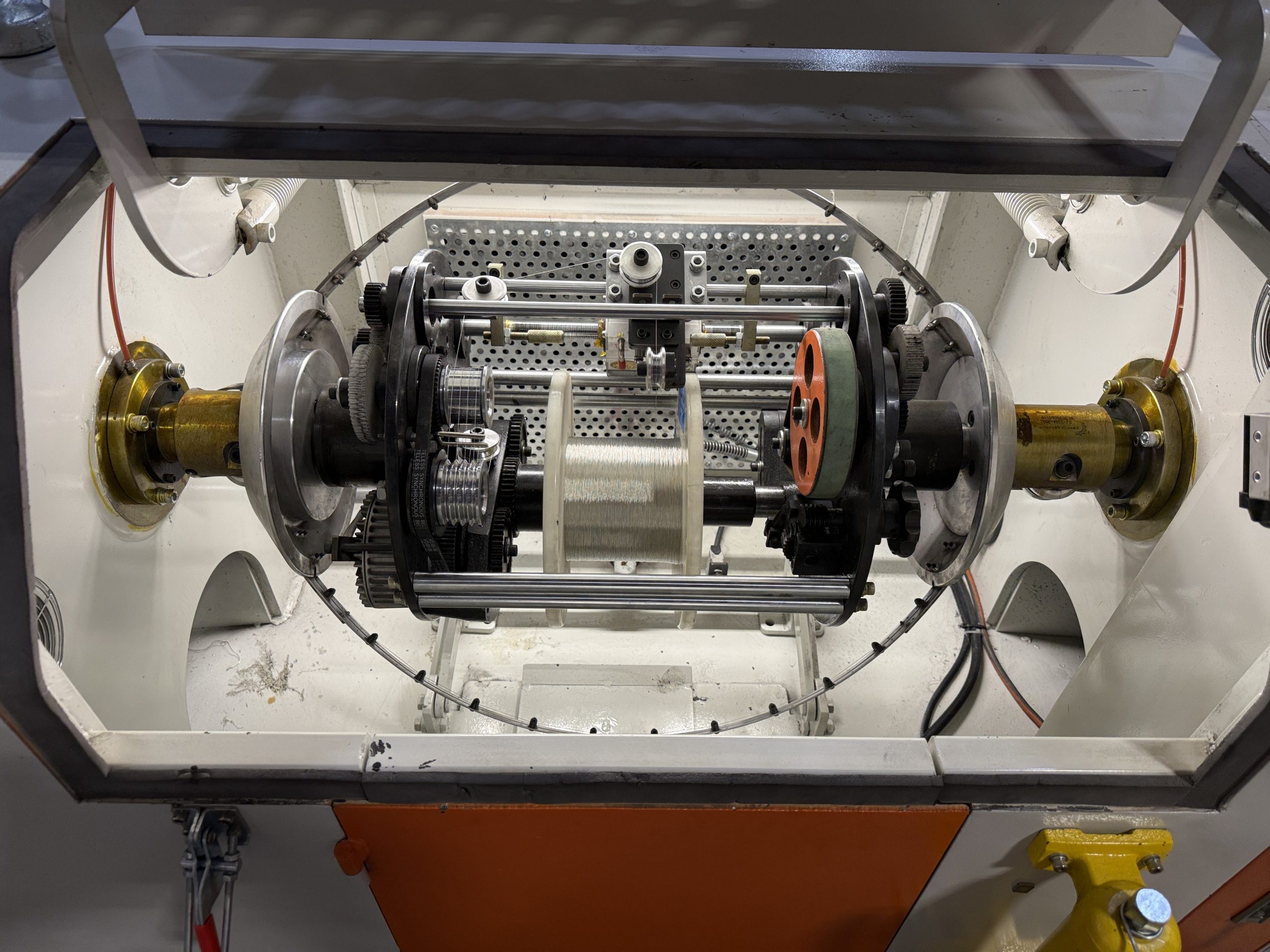 Inside the bunching machine showing the wire spool and rotating cage