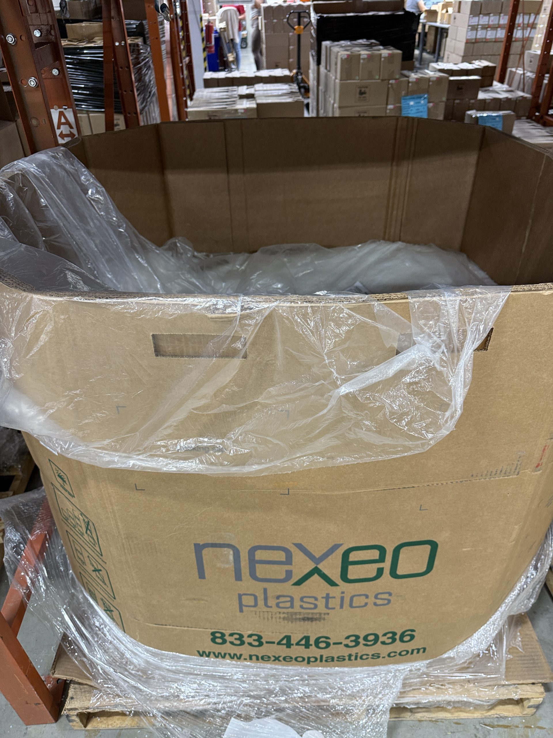 Inner jacket plastic beads in a Nexeo plastics box